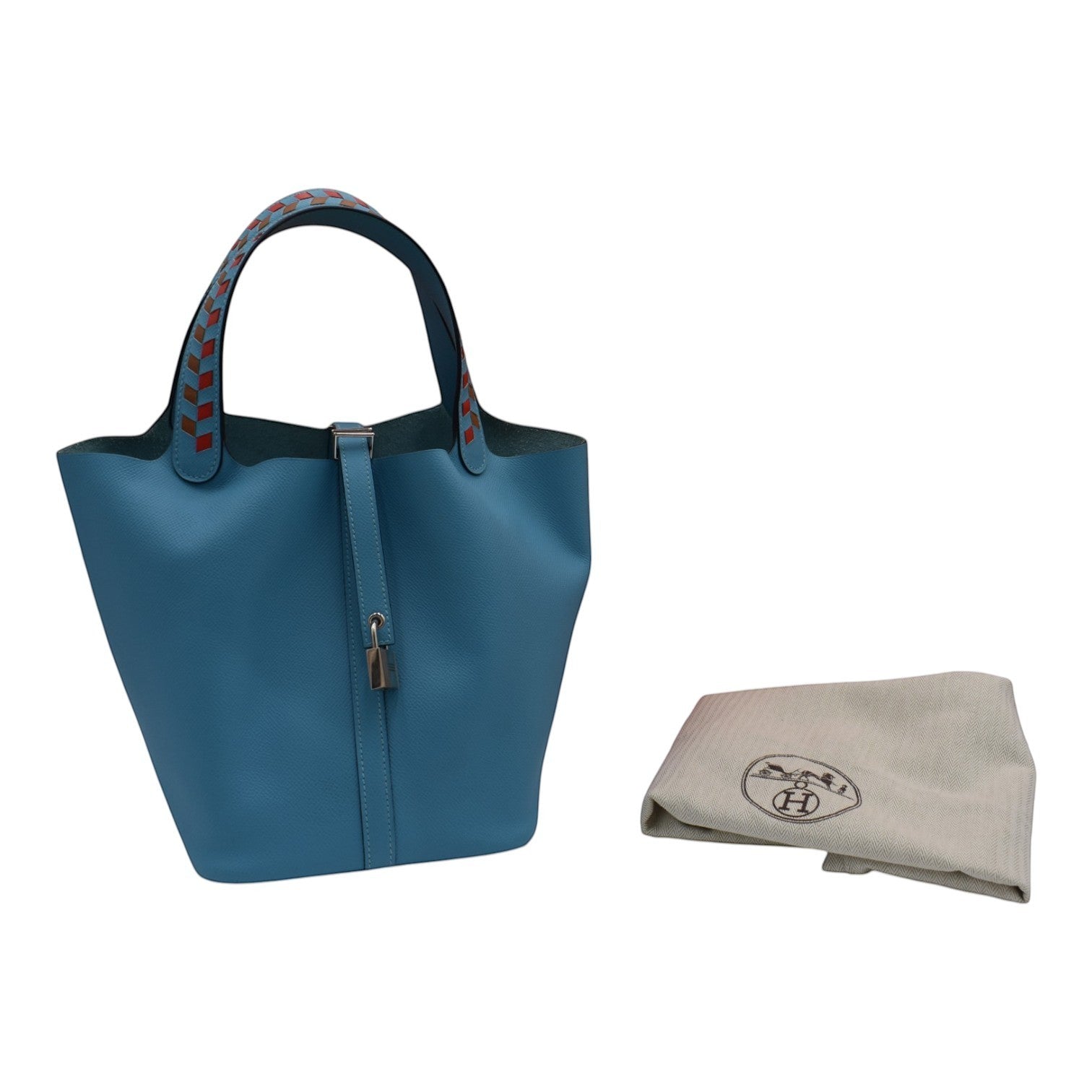 Soldi blue leather bucket bag with braided red and orange handles and a silver lock closure.