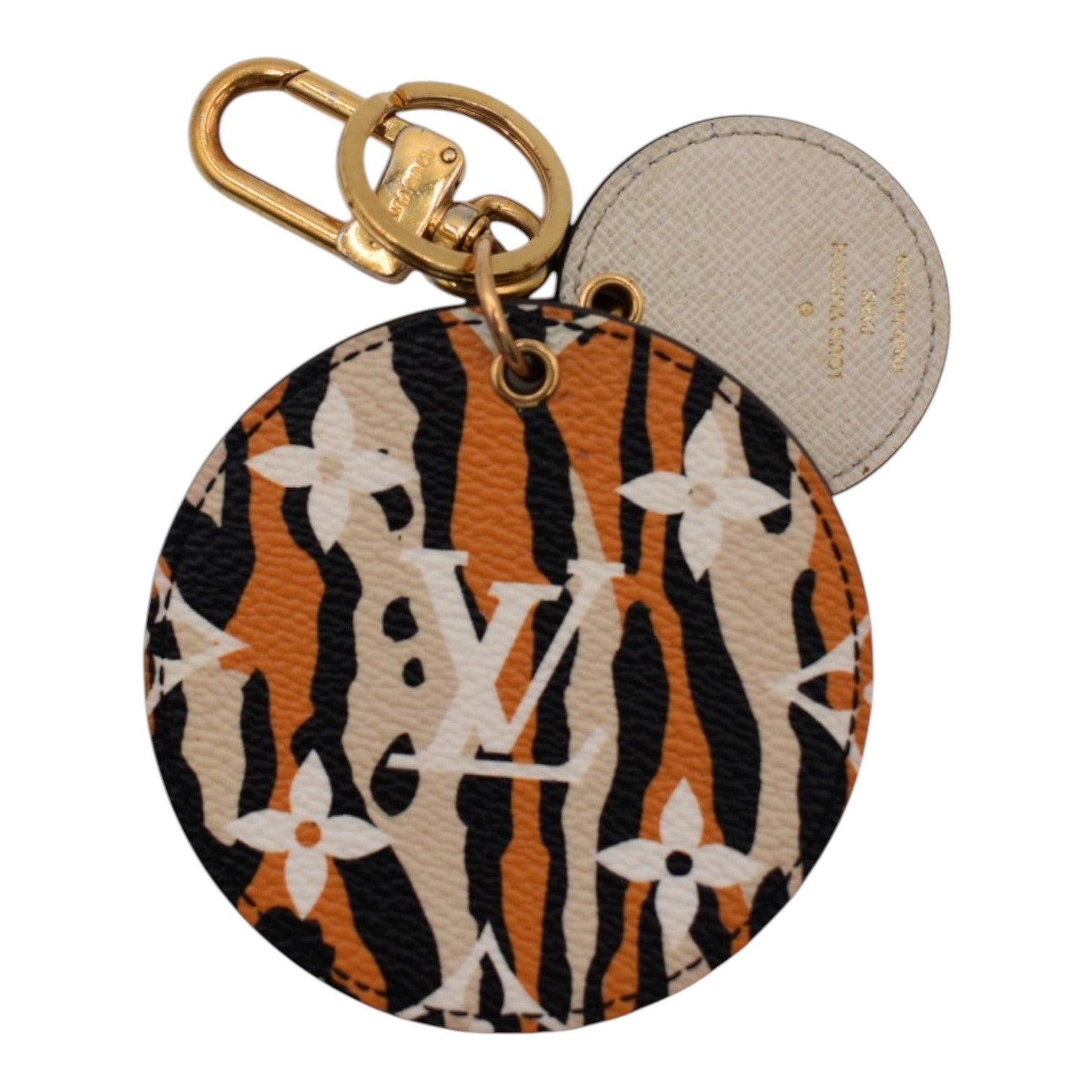 Soldi round bag charm with tiger stripe pattern, LV monogram, and gold hardware.