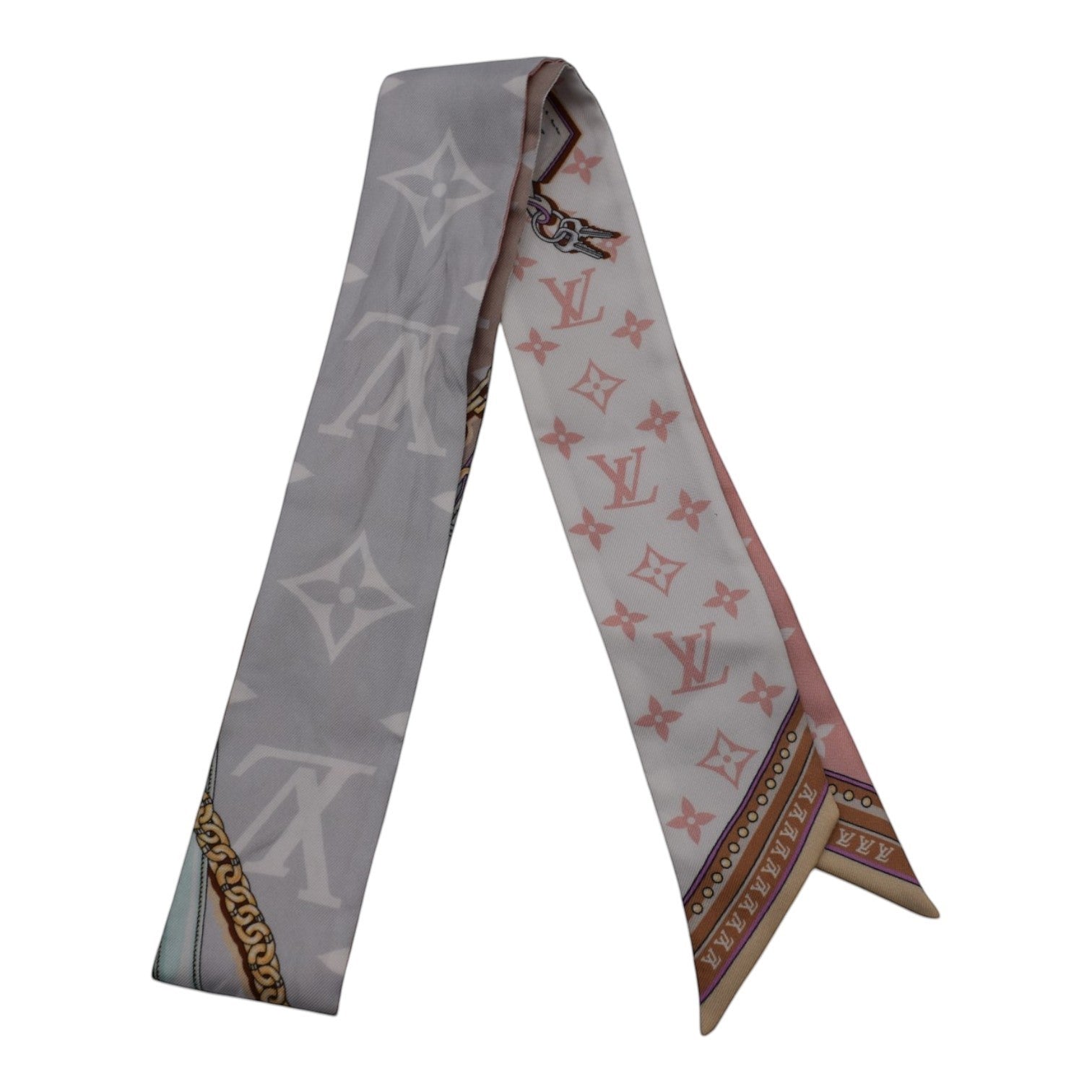 Soldi light pink twilly scarf with grey and white monogram pattern and gold chain detail.