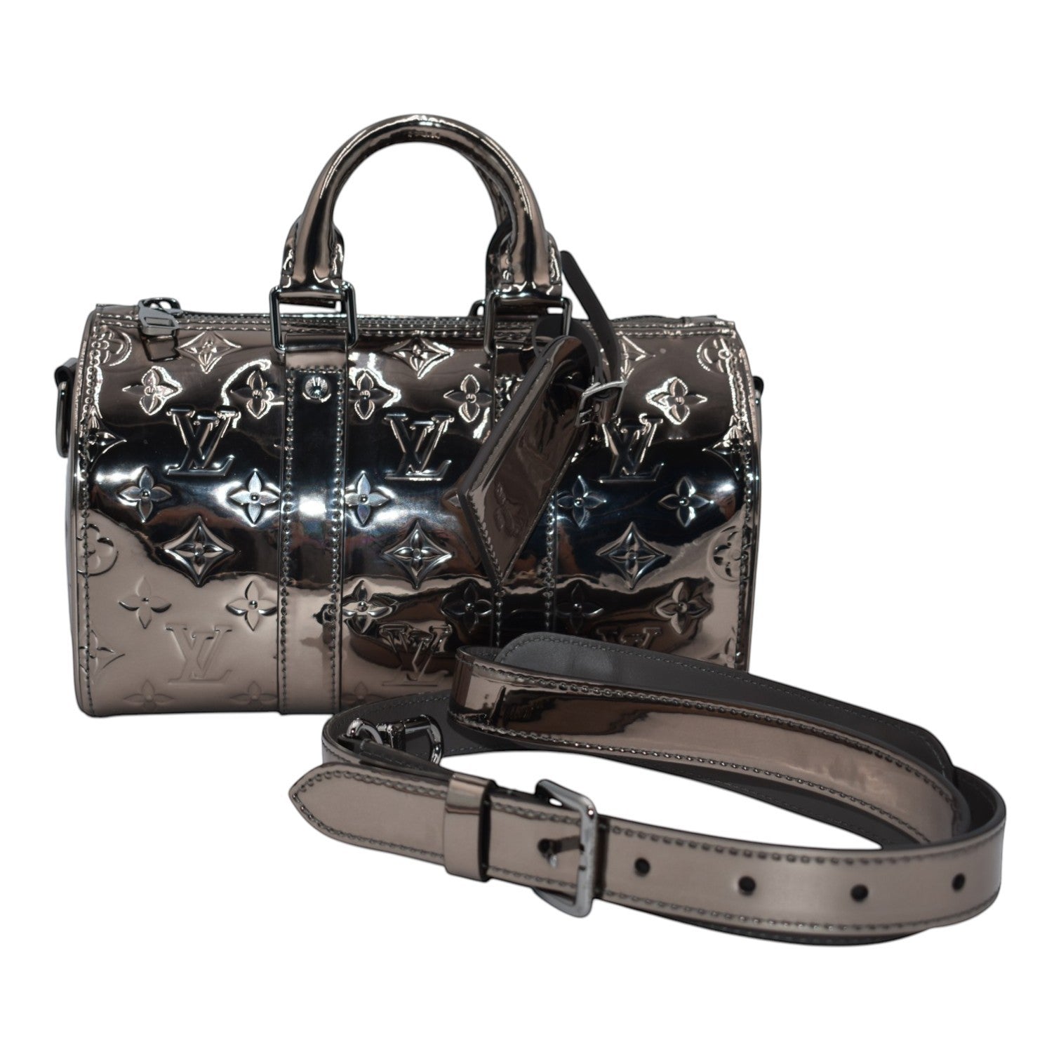 Soldi Louis Vuitton Metallic Silver Speedy handbag with embossed monogram pattern and detachable strap.