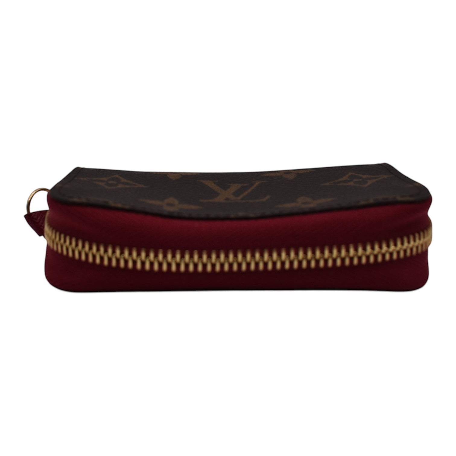 Soldi Monogram Fuchsia Multicartes with brown monogram canvas and fuchsia fabric, gold zipper.