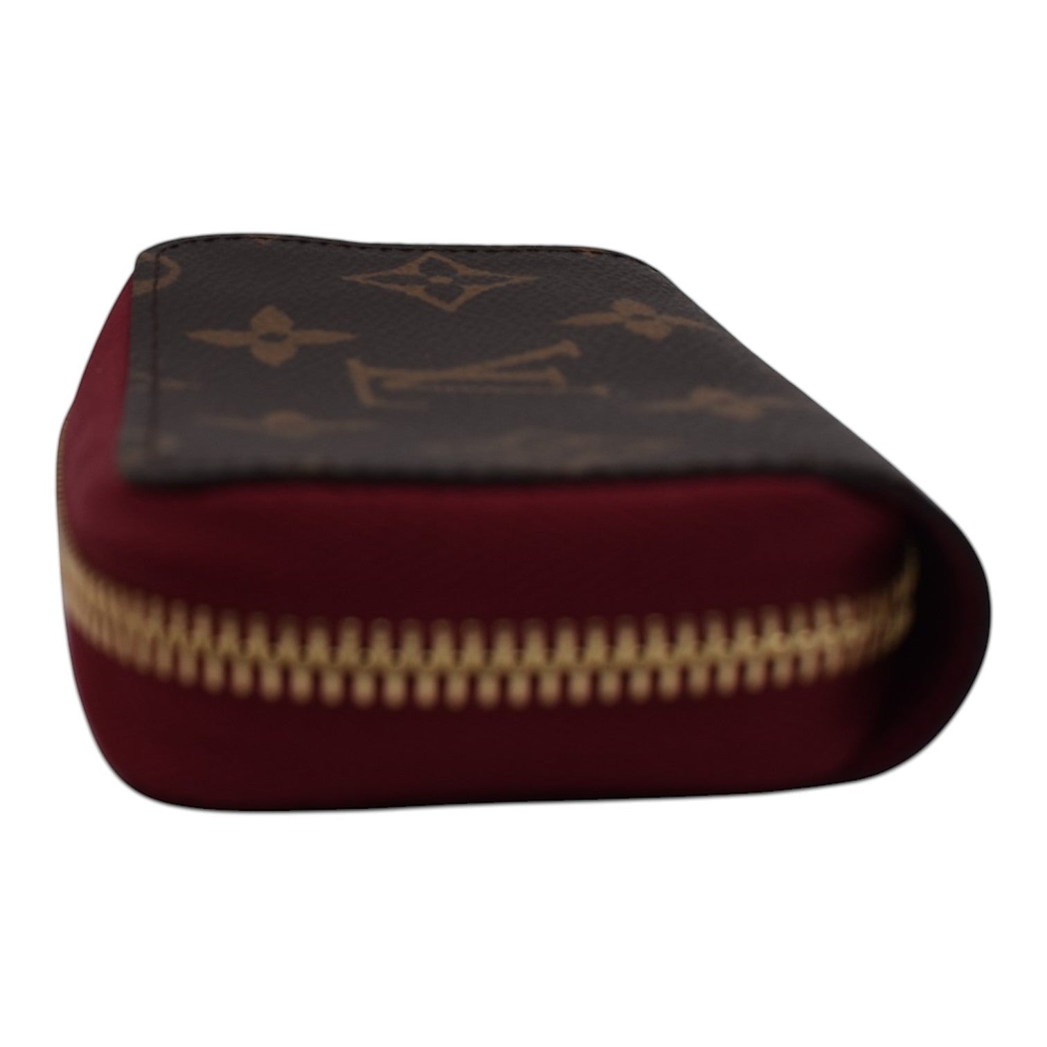 Soldi Monogram Fuchsia Multicartes wallet with brown monogram canvas and fuchsia canvas exterior.