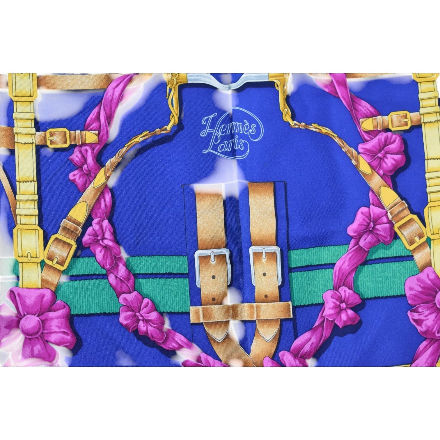 Soldi navy blue silk scarf with belt and buckle print, pink ribbon accents, and green stripe detail.