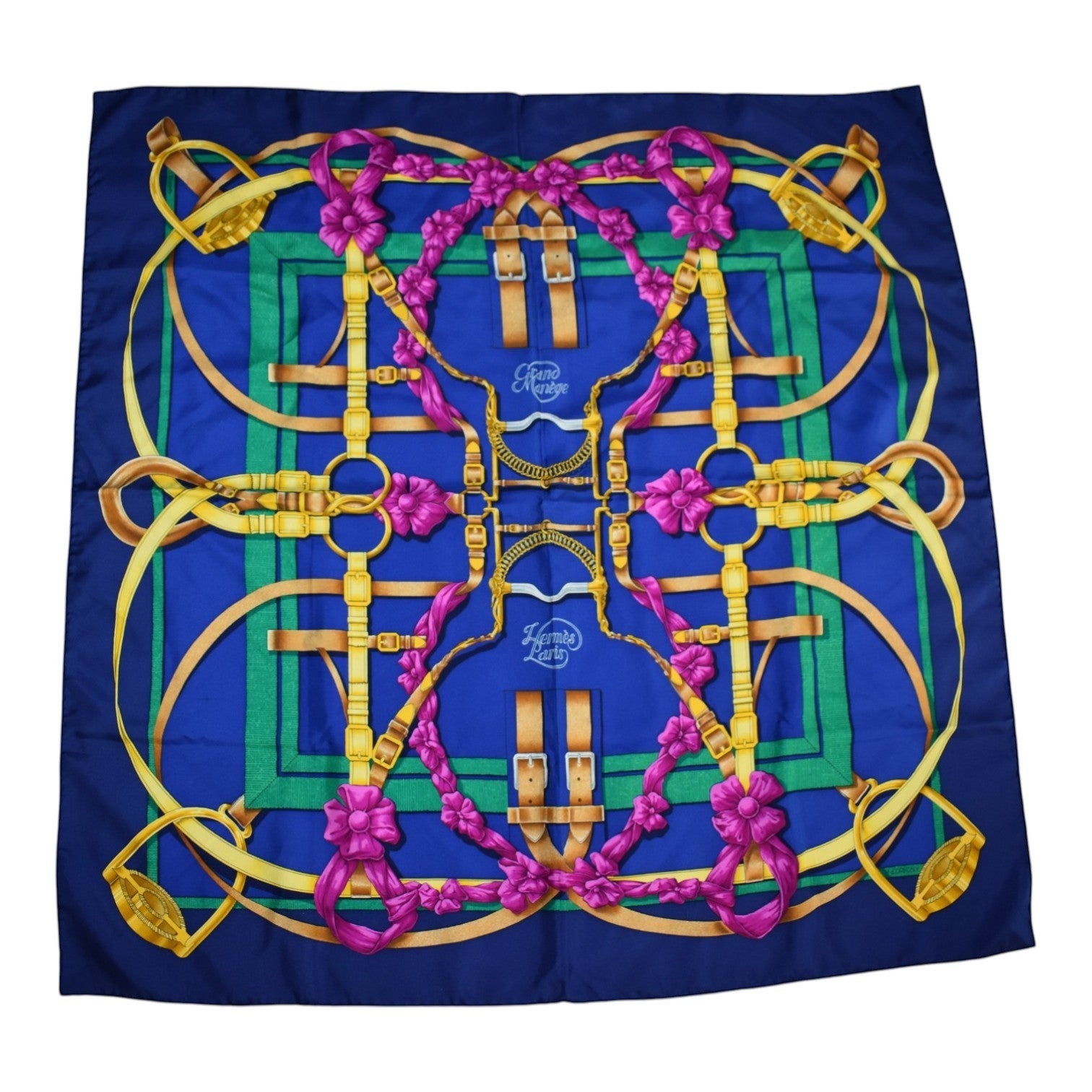 Soldi navy blue silk scarf with equestrian belt print, pink flowers, and gold hardware.