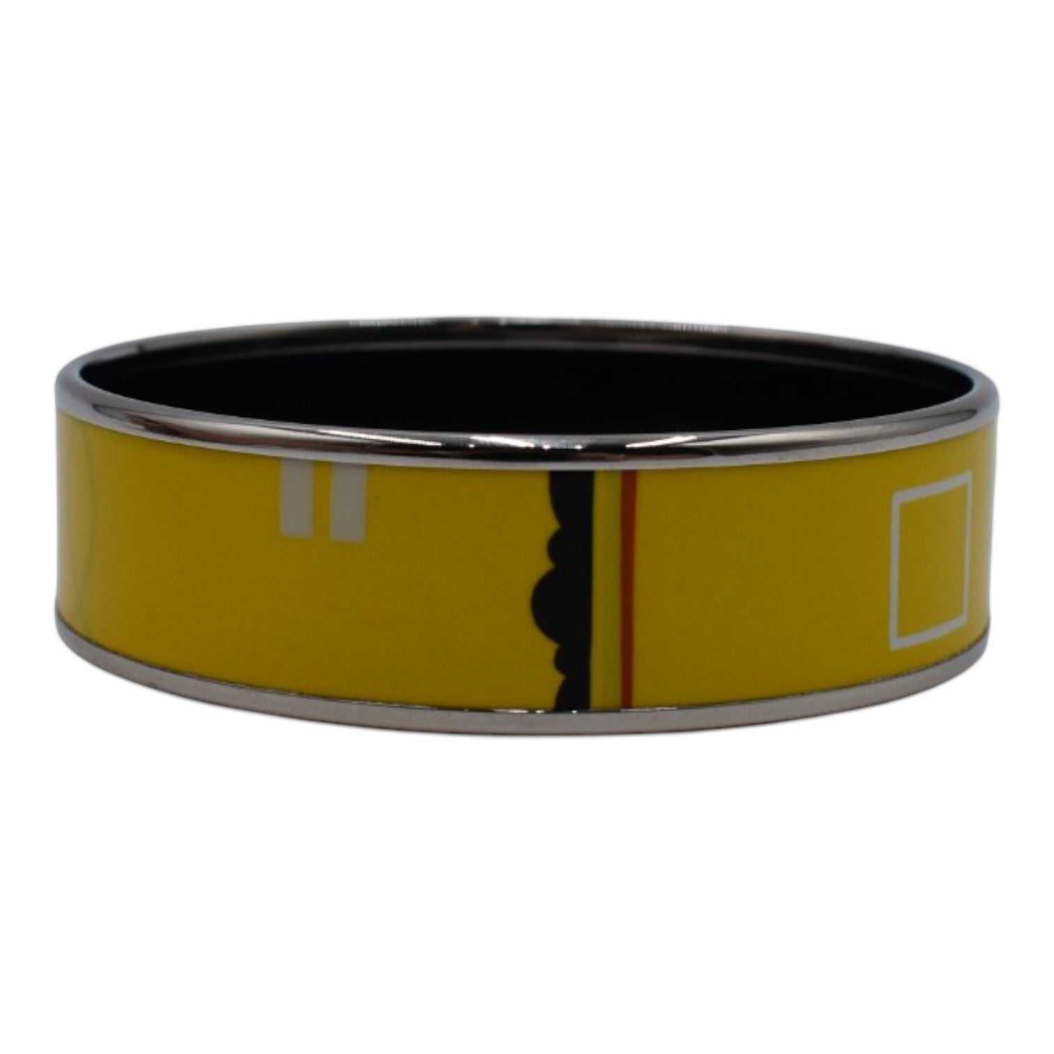 Soldi yellow enamel bangle with black and white graphic details and silver trim.