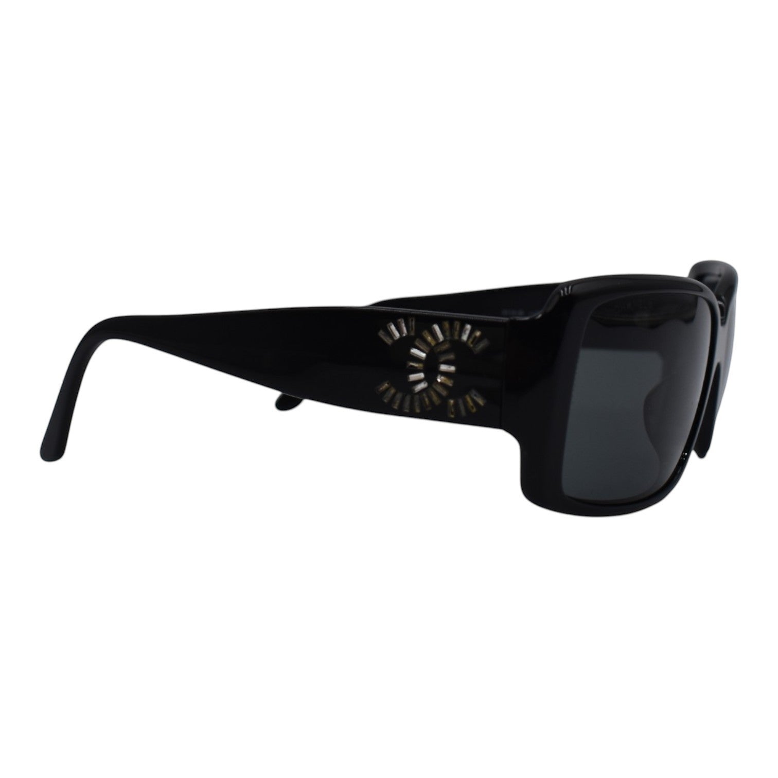 Soldi black baguette crystal logo sunglasses with dark lenses and embellished temples.
