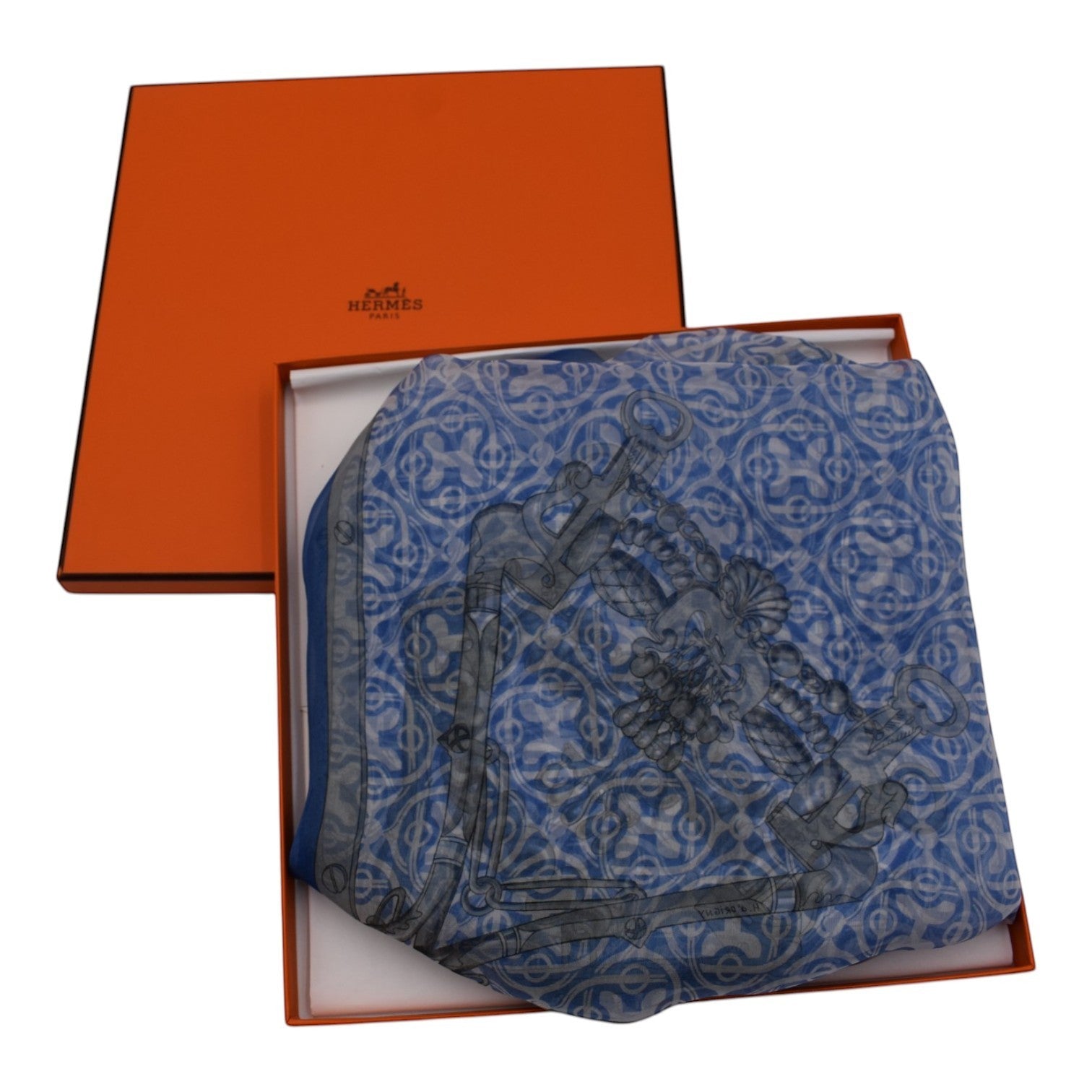 Soldi blue chiffon scarf with a grey equestrian bit pattern and ornate border.
