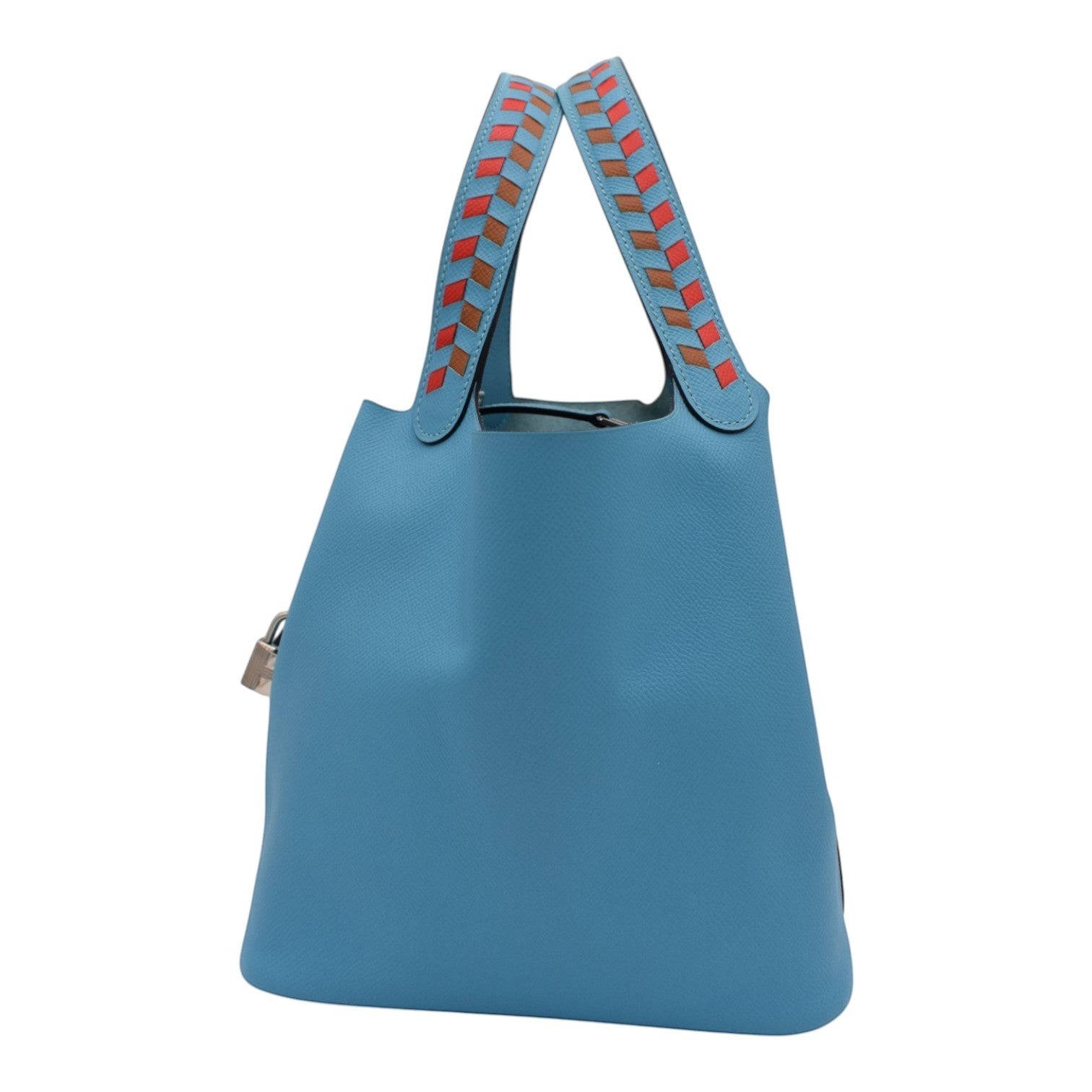 Soldi blue leather Hermes Picotin 18 bag with braided orange and brown handles and a silver padlock.