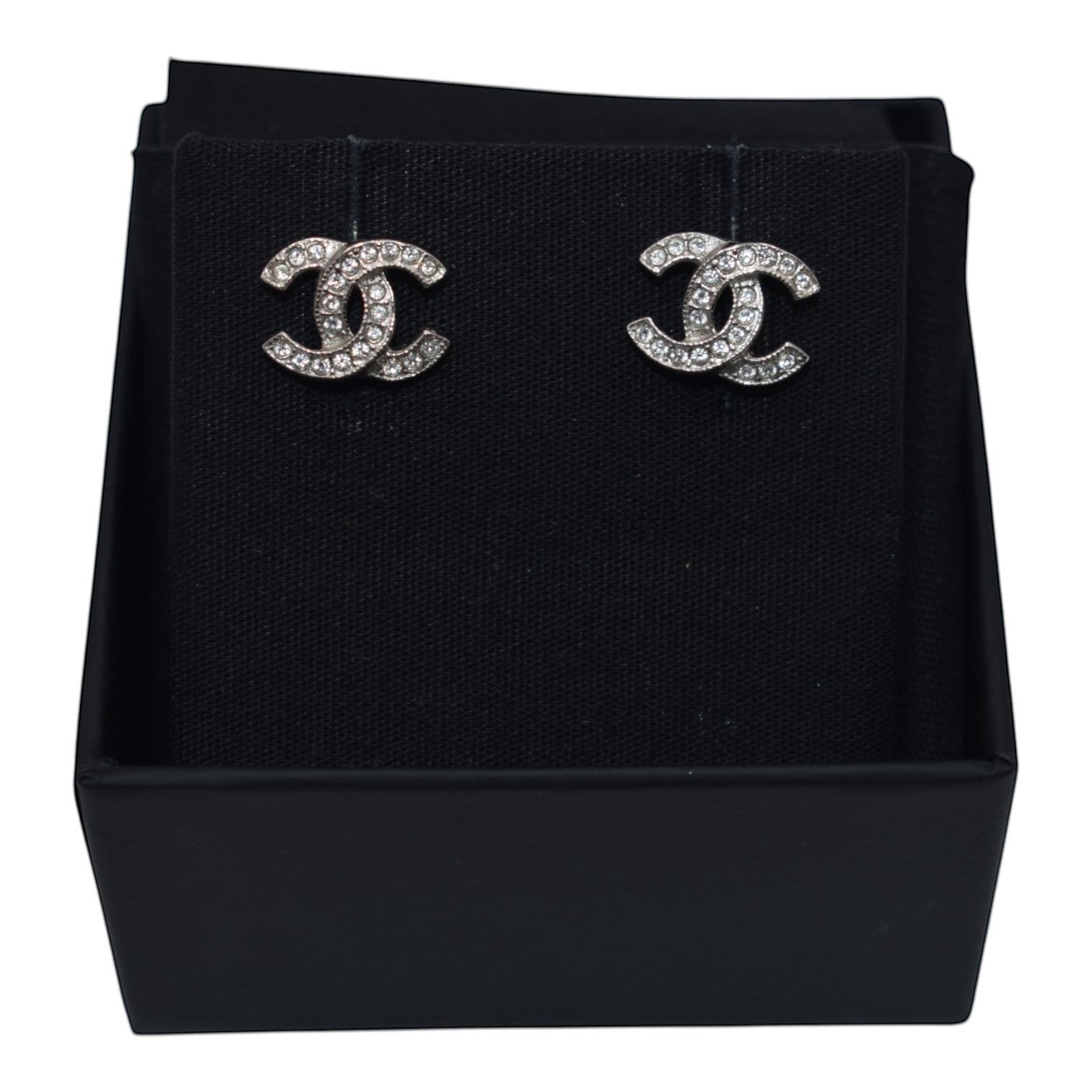 Soldi Crystal CC Stud Earrings with silver-tone metal and clear crystals.