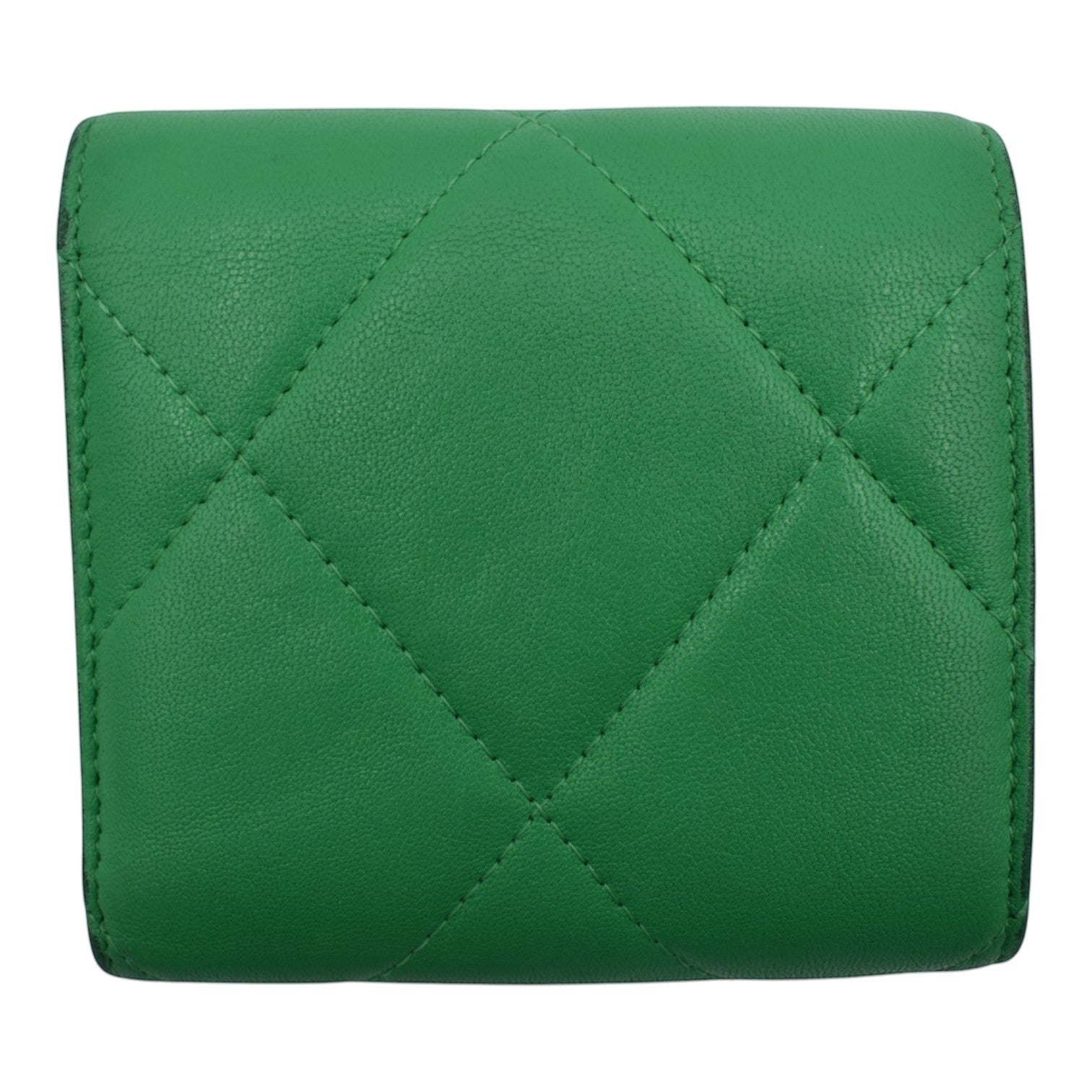 Soldi green quilted leather compact wallet with snap closure.