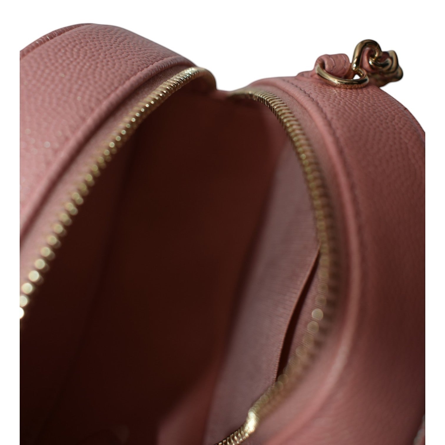 Soldi pink caviar leather mini vanity bag with pearl CC detail and gold hardware.
