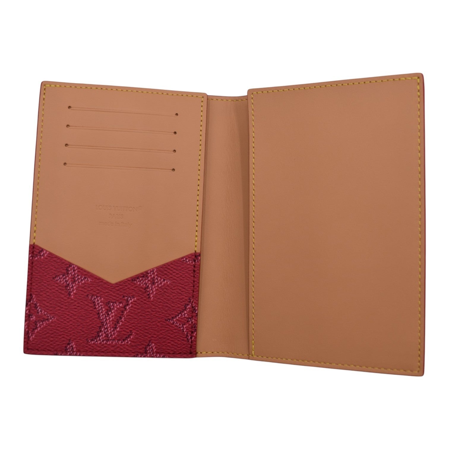 Soldi pink monogrammed passport cover with tan leather interior and card slots.