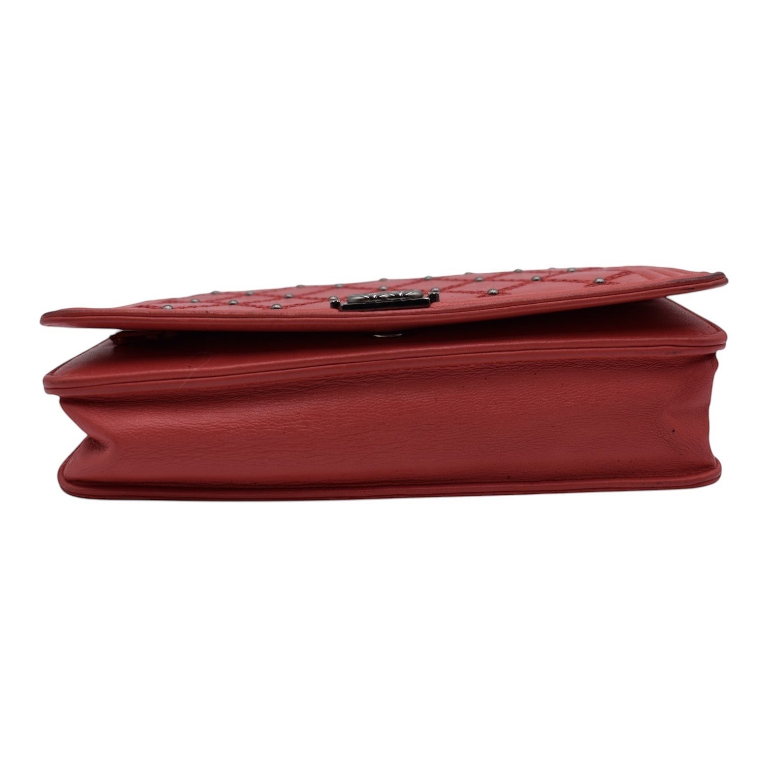 Soldi red quilted leather wallet on chain with silver grommets and silver hardware.