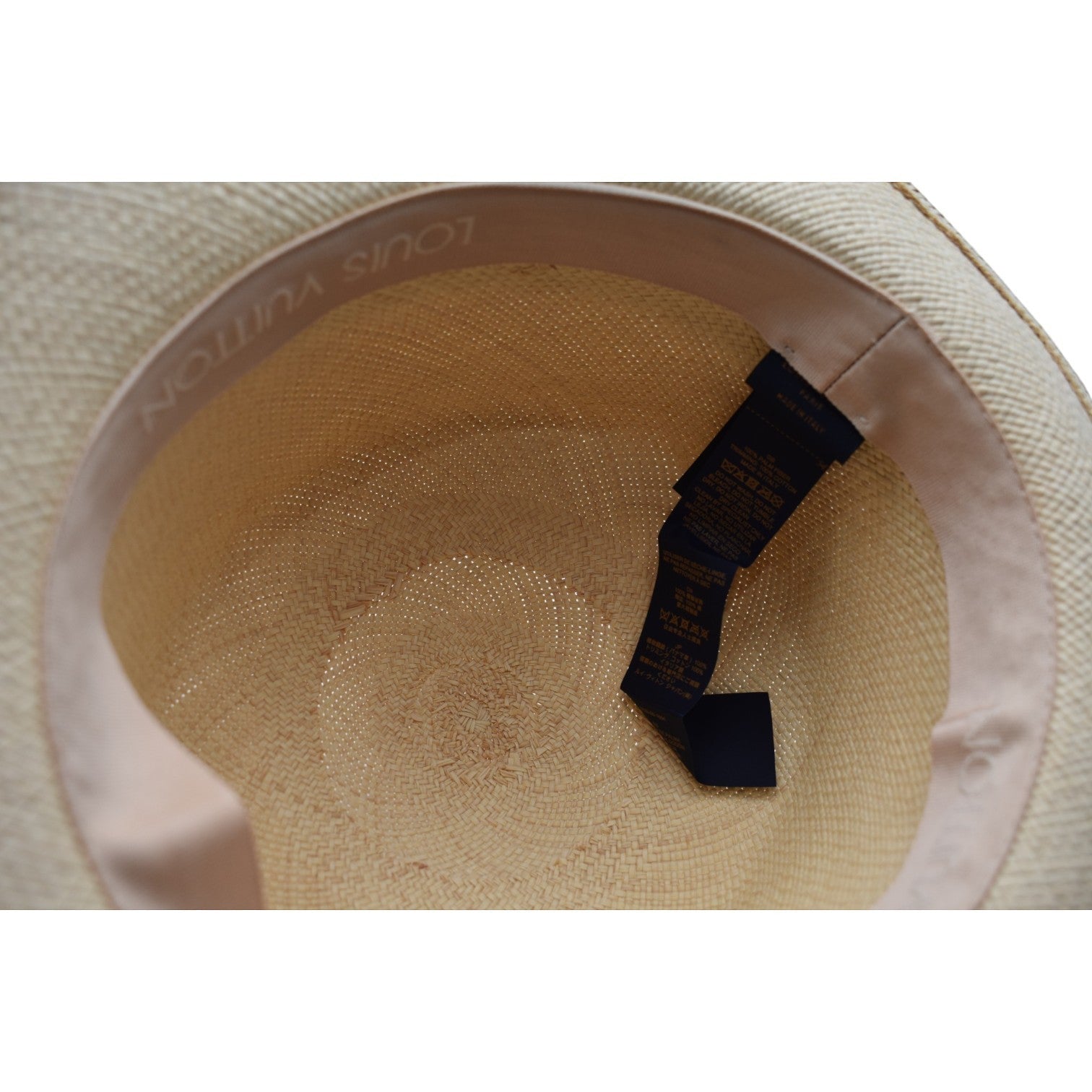 Soldi straw fedora hat with Louis Vuitton branding inside. Natural straw color.