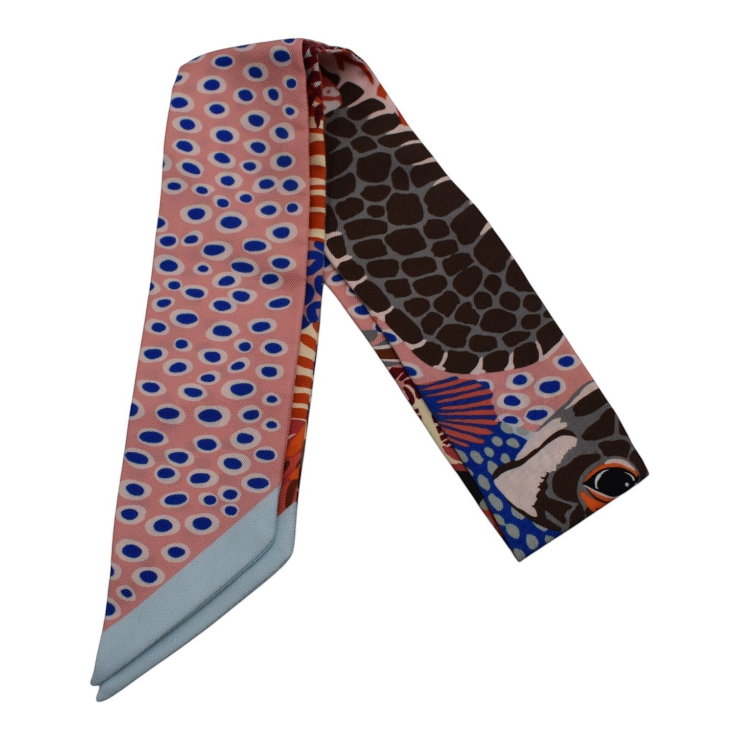 Soldi pink twilly scarf with blue polka dots, giraffe print, and fish motifs. Silk accessory.