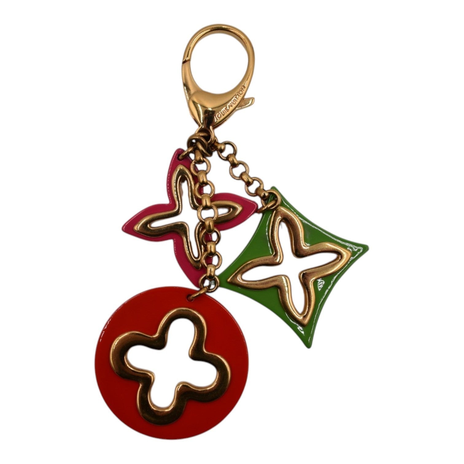 Soldi Vivienne bag charms in red, green, and pink with gold-tone hardware and clover motifs.