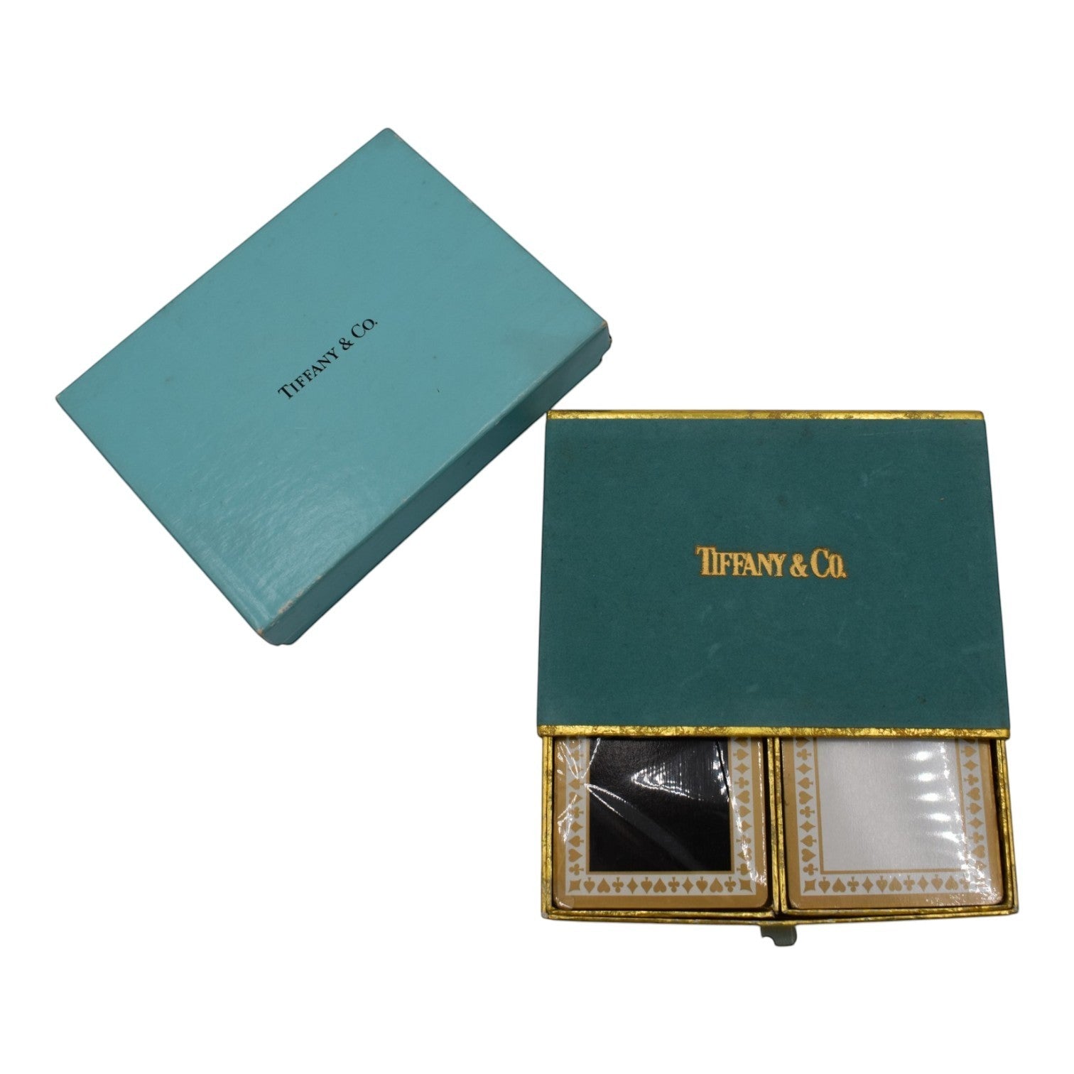 Tiffany & Co. black and white playing cards in a teal box with gold trim.